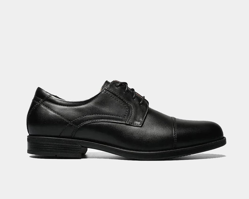 Florsheim Midtown Cap Oxford dress shoes in black leather with cap toe design and stacked heel, side view.
