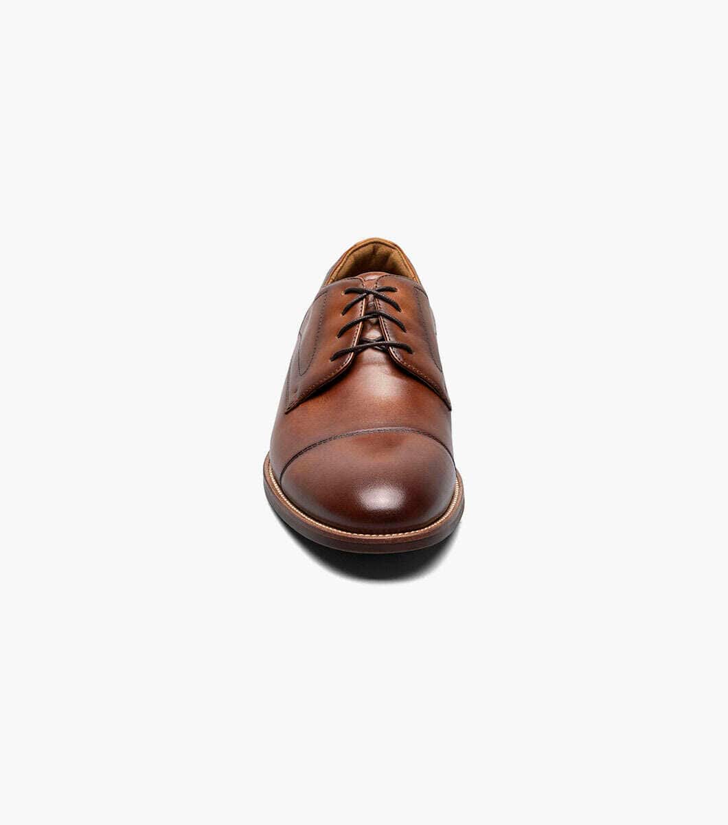 Florsheim Rucci Cap Oxford dress shoes in brown leather with cap toe and lace-up closure, front view.