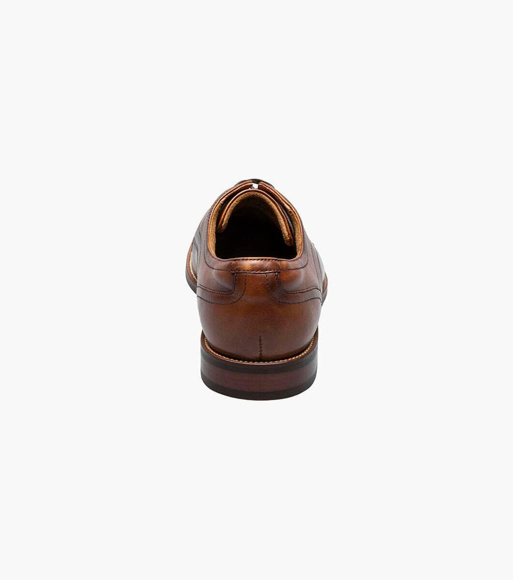 Florsheim Rucci Cap Oxford dress shoes in brown leather with stitched detailing and stacked heel, back view.