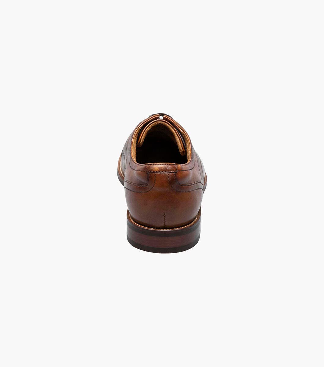 Florsheim Rucci Cap Oxford dress shoes in brown leather with stitched detailing and stacked heel, back view.
