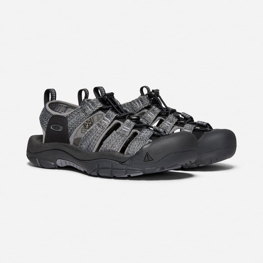 Keen Newport H2 sandals in gray with black accents, featuring a breathable webbed upper and durable rubber outsole, angled front view.