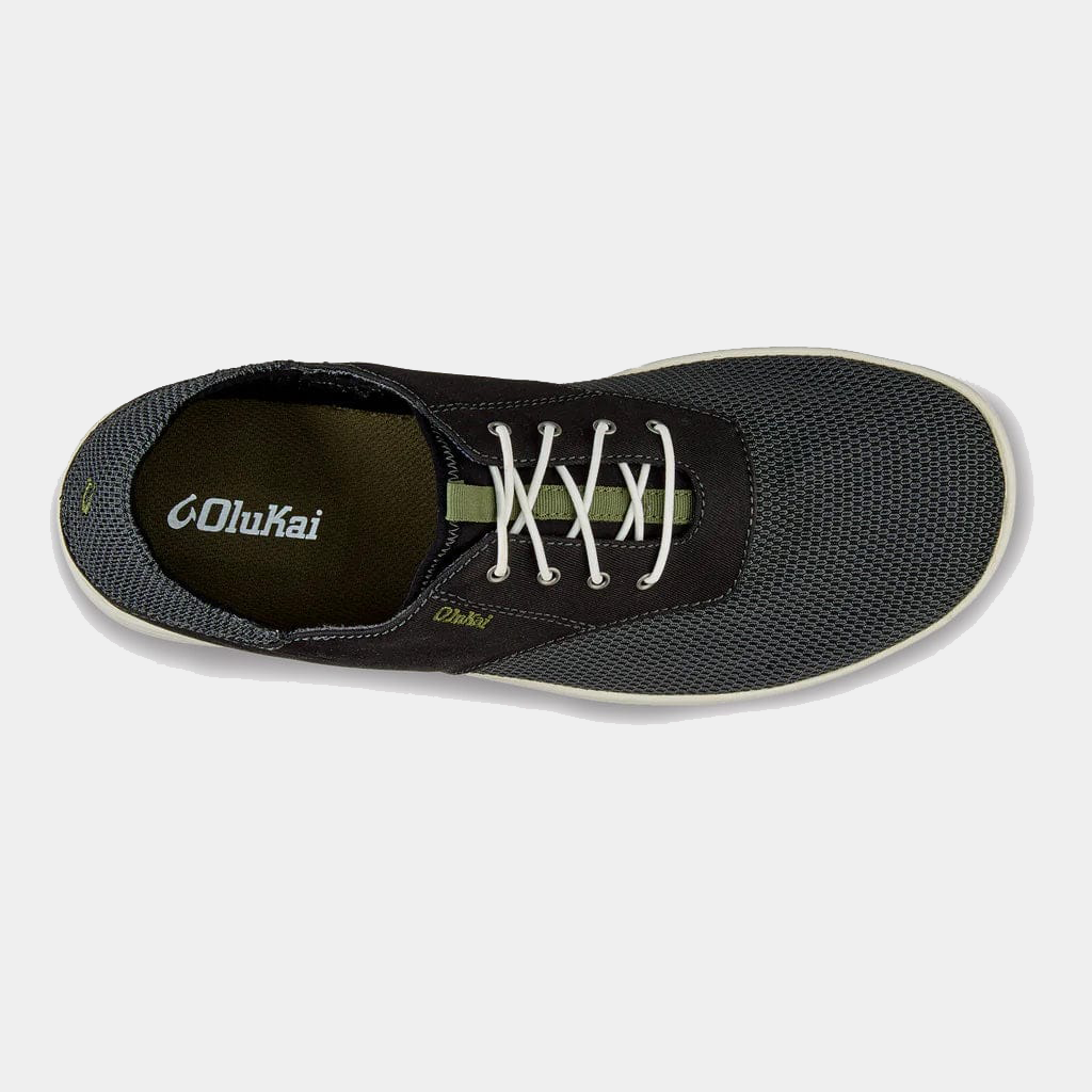 OluKai Nohea Moku shoes top view in black with breathable mesh upper, white laces, and green inner lining.