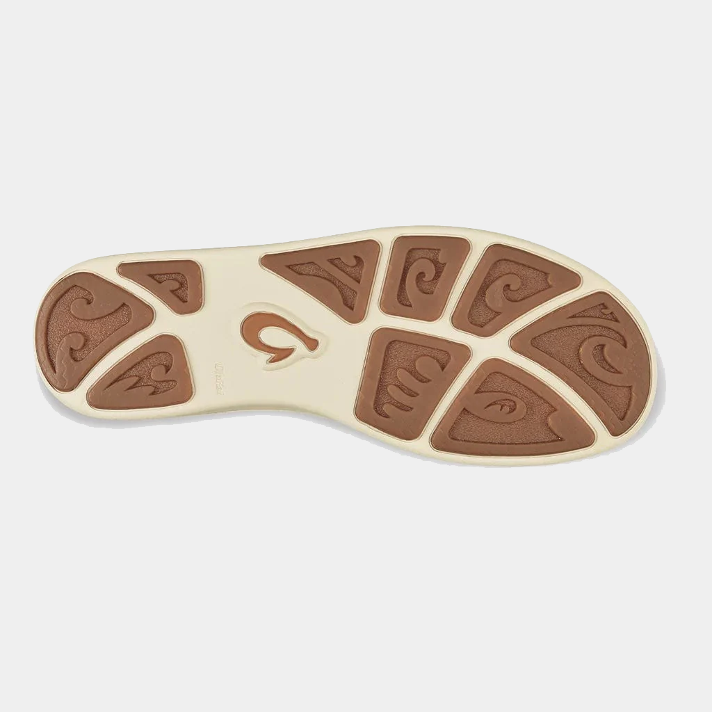 OluKai Nohea Moku shoe outsole with non-marking rubber and Polynesian-inspired design in tan and brown, sole view.