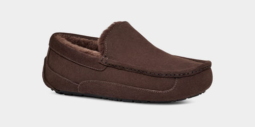UGG Ascot Suede slippers in dark brown suede with stitching details and plush shearling lining, side view.