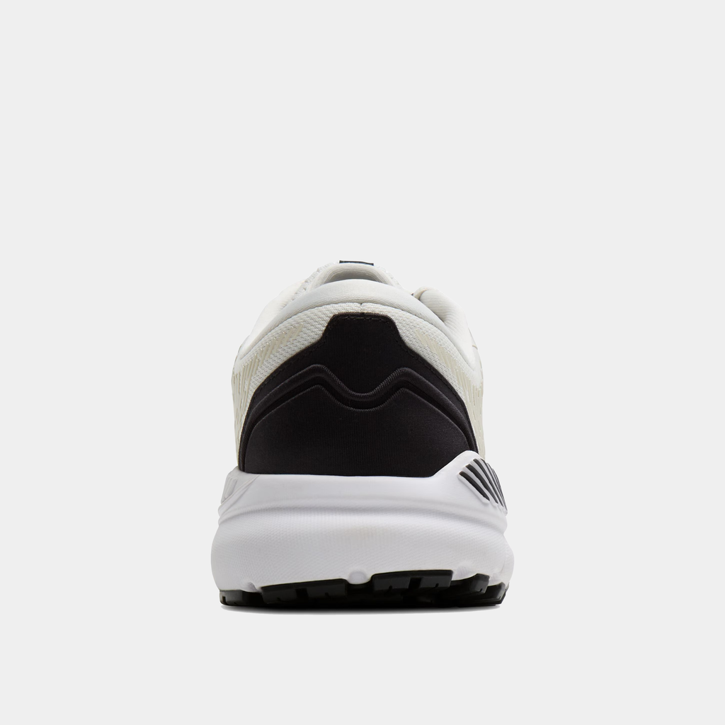 Brooks Addiction GTS 15 running shoes back view showcasing black and white heel counter and sturdy midsole.