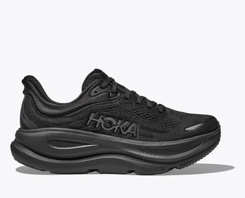 HOKA Bondi 9 running shoes in all-black with engineered mesh upper, cushioned midsole, and reflective details, side view.