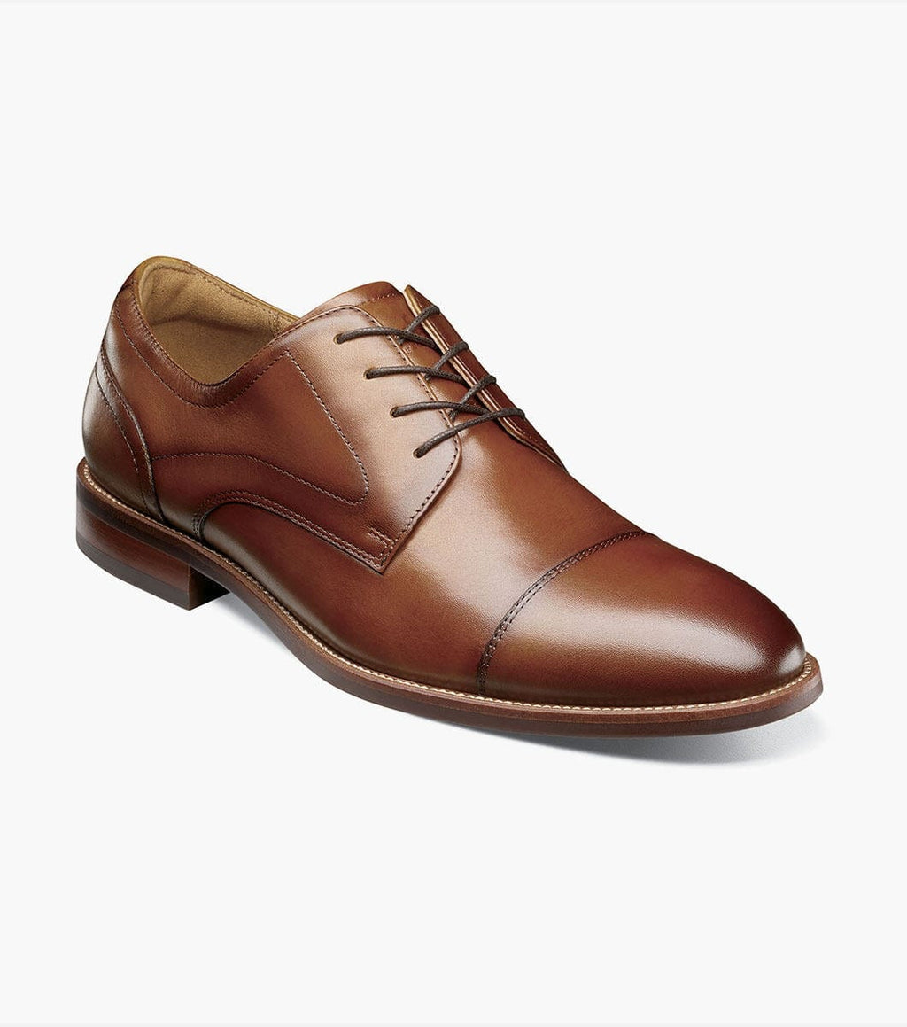 Florsheim Rucci Cap Oxford dress shoes in brown leather with cap toe detail and lace closure, angled side view.