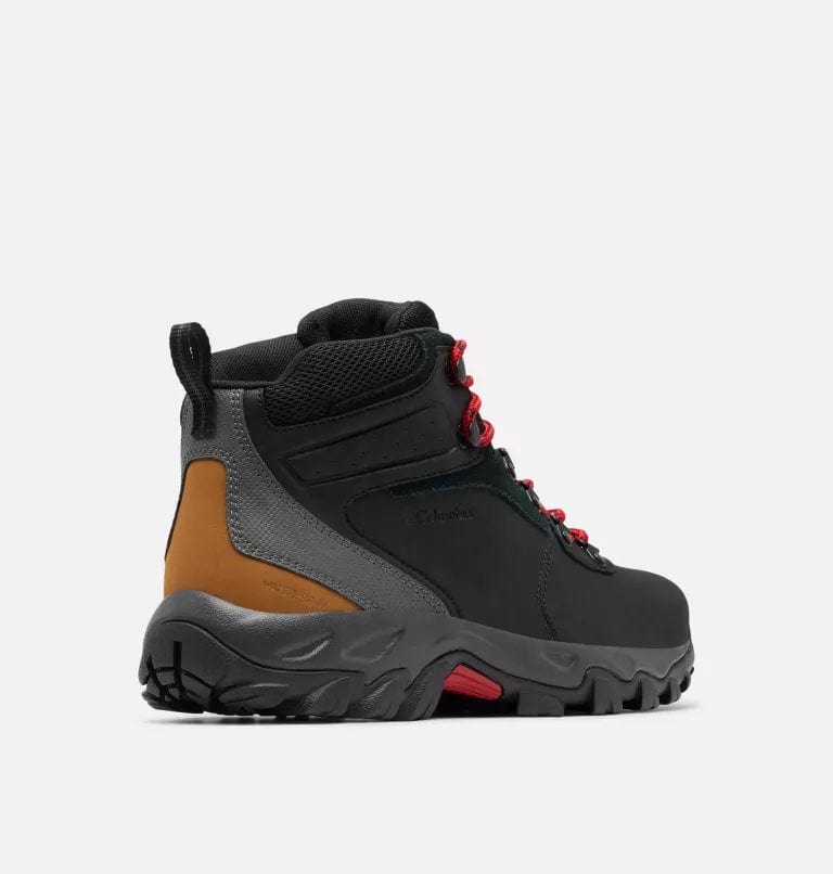 Columbia Newton Ridge Plus II Waterproof hiking boots in black with red laces, brown heel accents, and rugged outsole, side view.