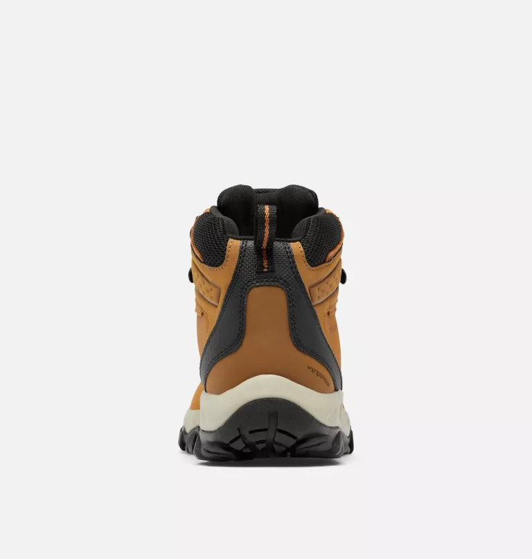 Columbia Newton Ridge Plus II Waterproof hiking boots in brown with black accents and rubber outsole, back view showing heel support and waterproof detail.