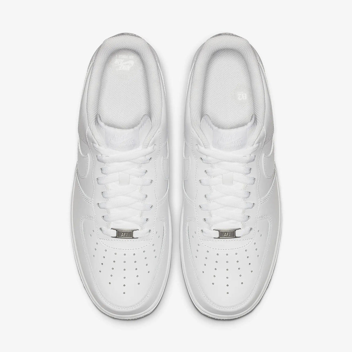 Nike Air Force 1 '07 sneakers in white leather with perforated toe box and lace design, top view.