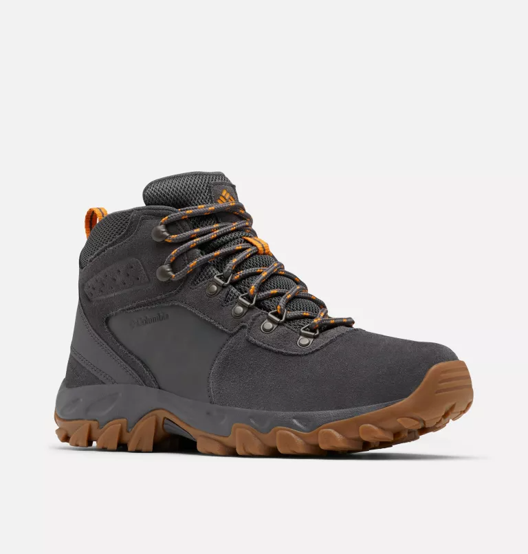 Columbia Newton Ridge Plus II Suede WP hiking boots in gray suede with orange accents and gum rubber outsole, side view.