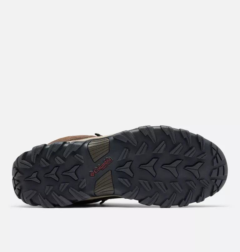 Columbia Newton Ridge Plus II Suede WP hiking boots outsole with rugged tread pattern and Columbia logo in black rubber, bottom view.
