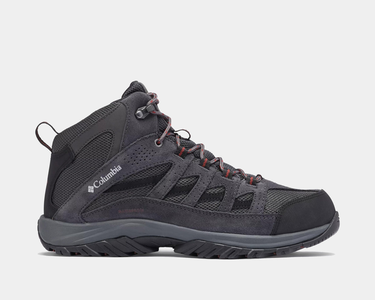 Columbia Crestwood Mid Waterproof hiking boots in gray with mesh and suede uppers, red lace accents, and durable outsole, side view.