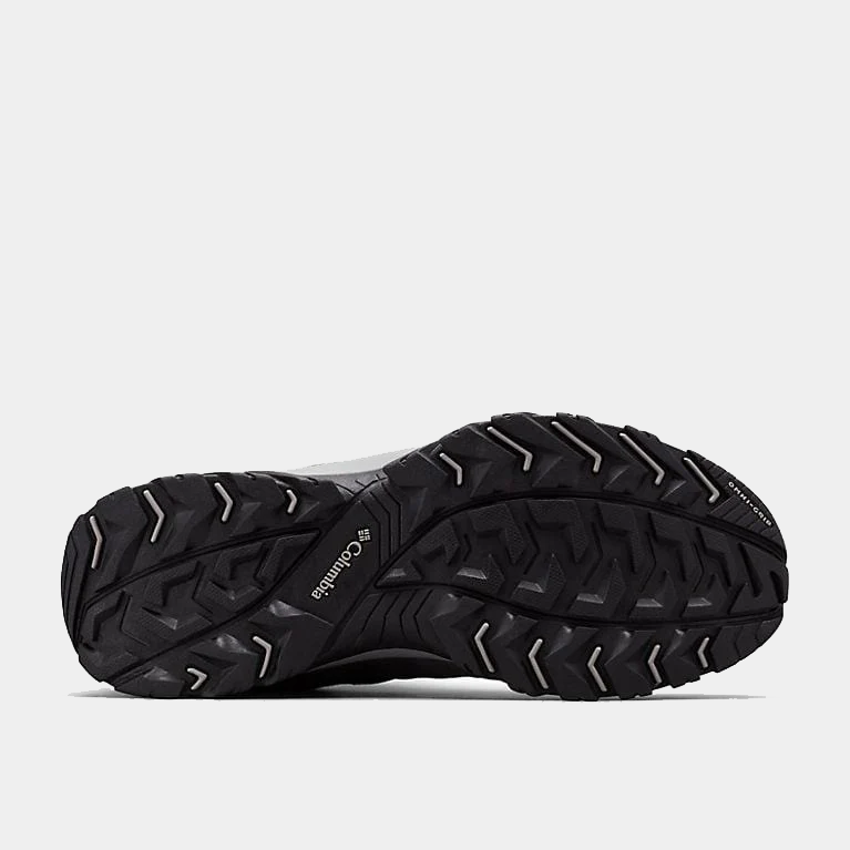 Columbia Crestwood Low hiking shoes outsole with Omni-Grip traction and rugged tread patterns in black rubber, sole/bottom view.
