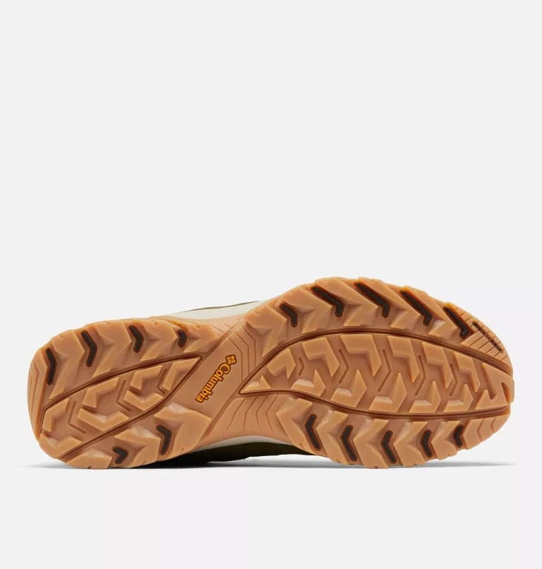 Columbia Crestwood Low hiking shoes outsole showing durable rubber tread pattern in tan and black for superior grip.