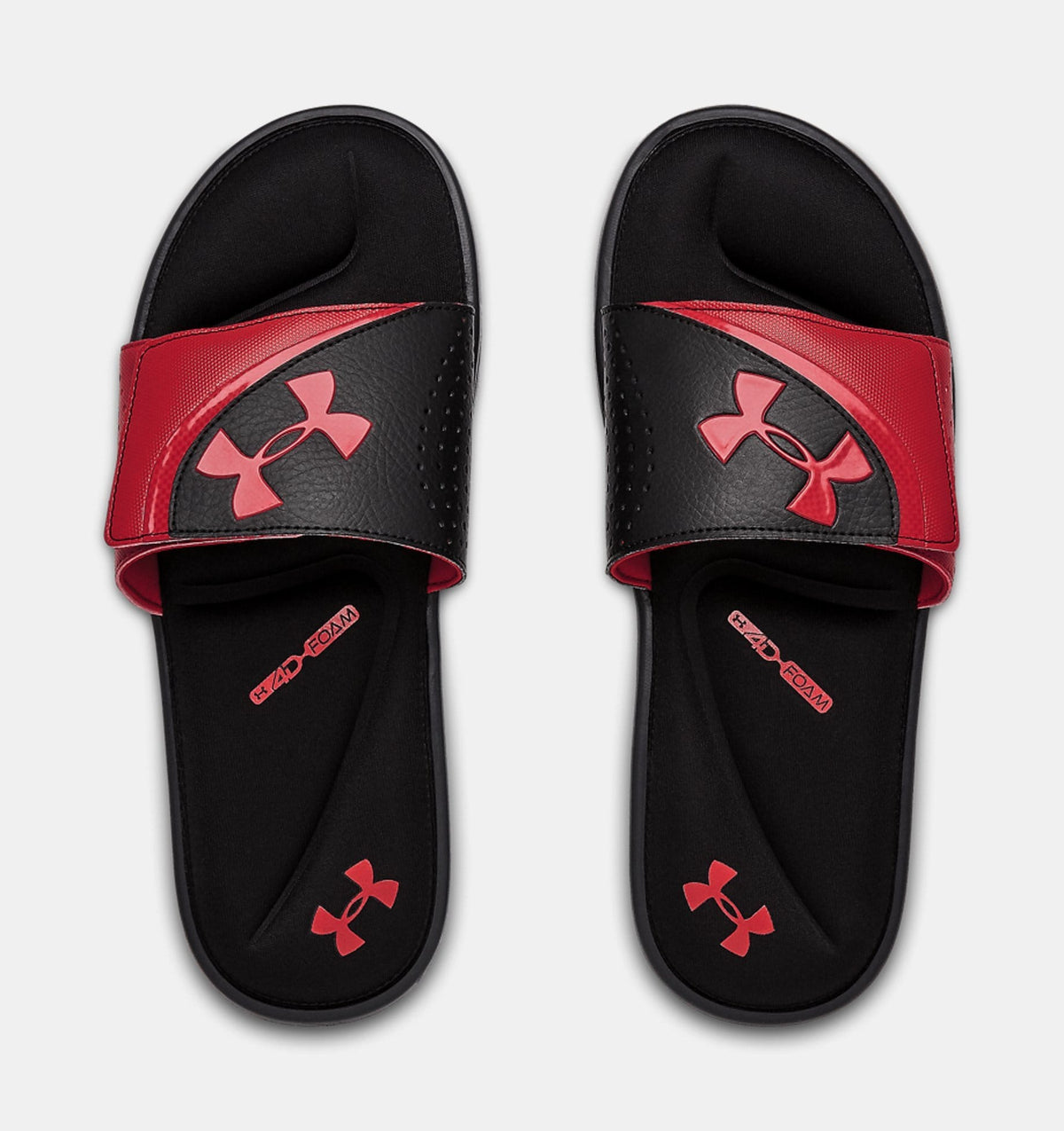 Under Armour Ignite VI SL slides in black and red with cushioned footbed and adjustable strap, top view.