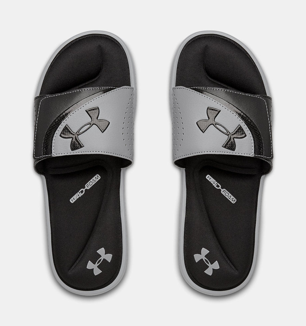Under Armour Ignite VI SL slides in gray and black with perforated strap, foam cushioning, and logo detailing, top view.