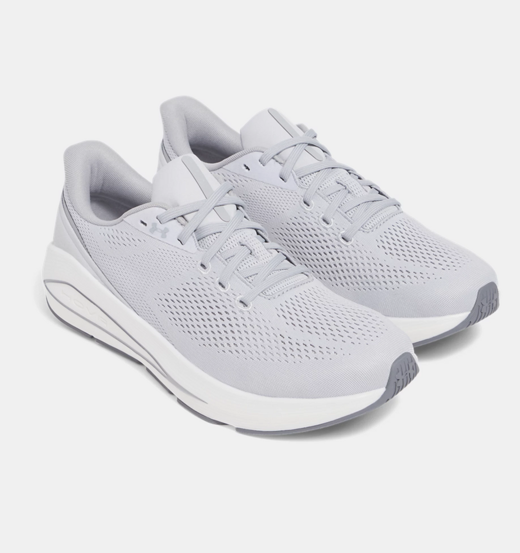 Under Armour HOVR Sonic 7 running shoes in light gray with engineered mesh upper and cushioned white midsole, angled front side view.