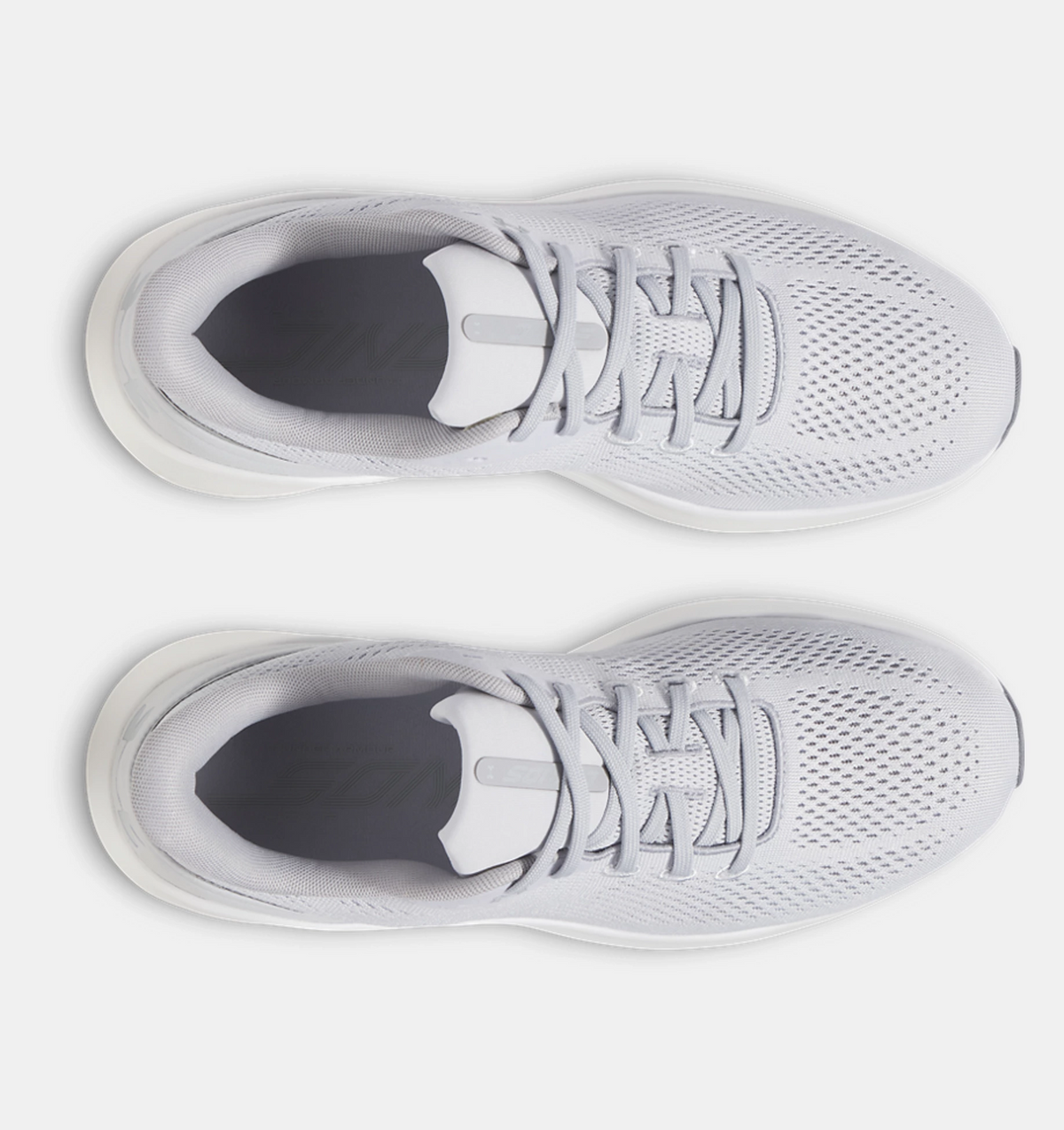 Under Armour HOVR Sonic 7 running shoes in light gray with mesh upper and lace system, top view.