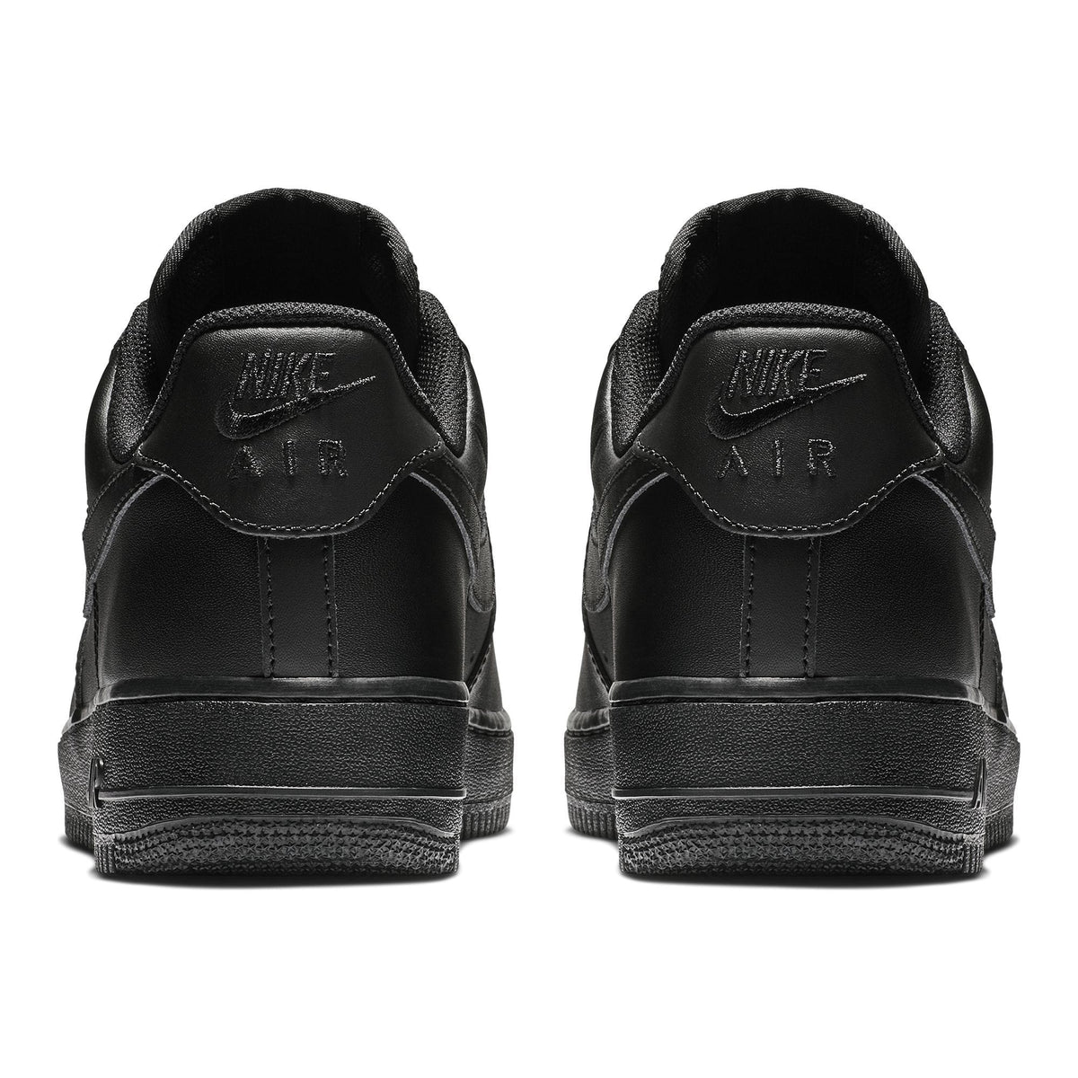 Nike Air Force 1 '07 sneakers in black, back view showing embossed Nike Air branding and textured heel design.