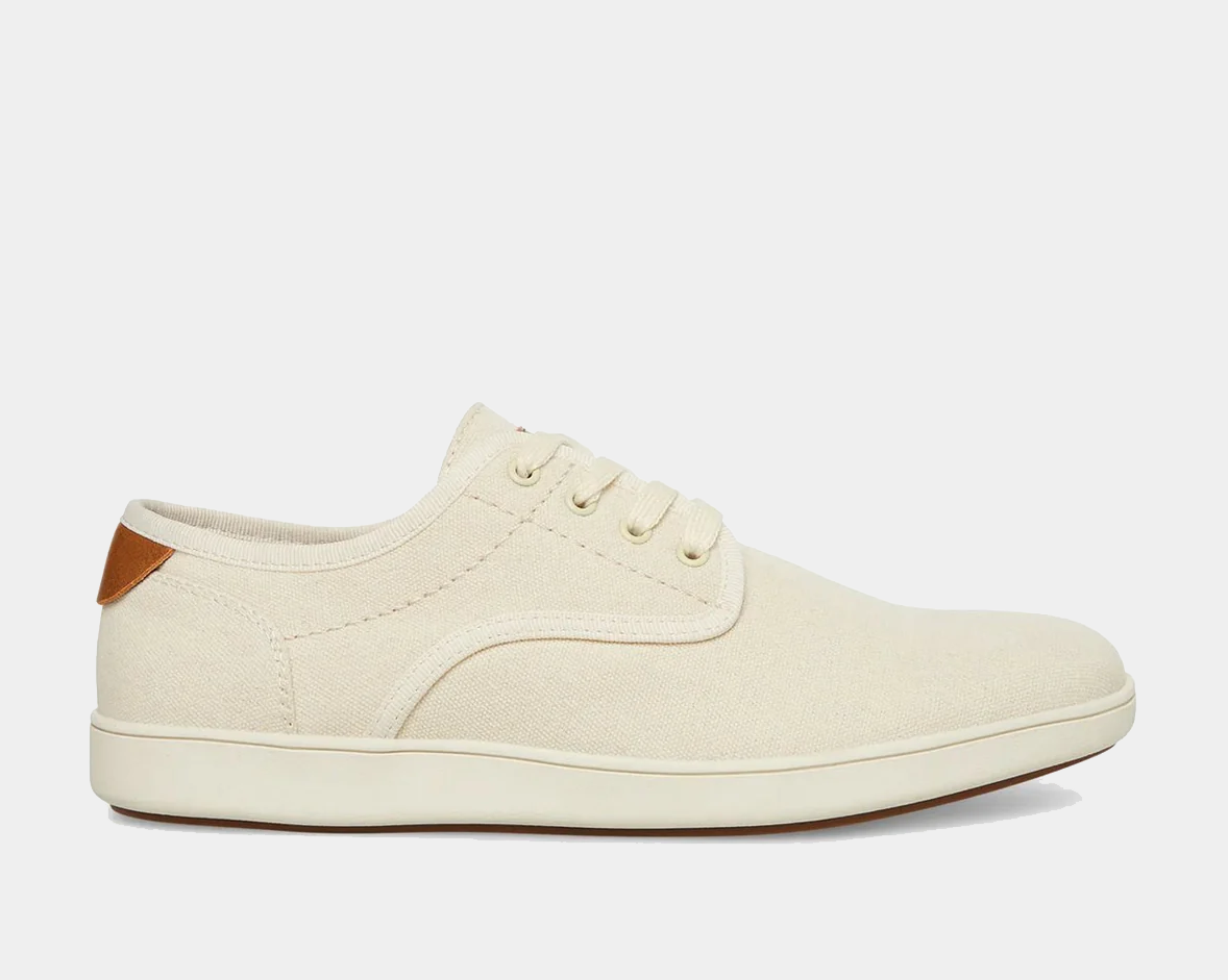 Steve Madden Fenta casual shoes in cream-colored canvas with lace-up closure and tan leather heel accent, side view.