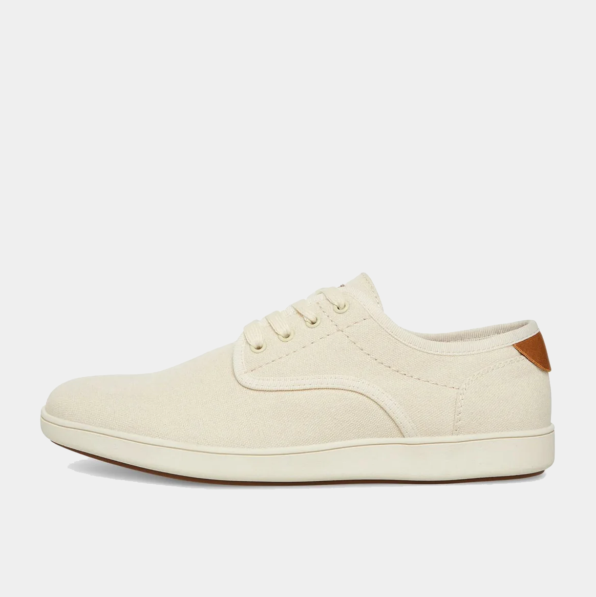 Steve Madden Fenta casual shoes in cream canvas with lace-up design and tan accent on the heel, side view.