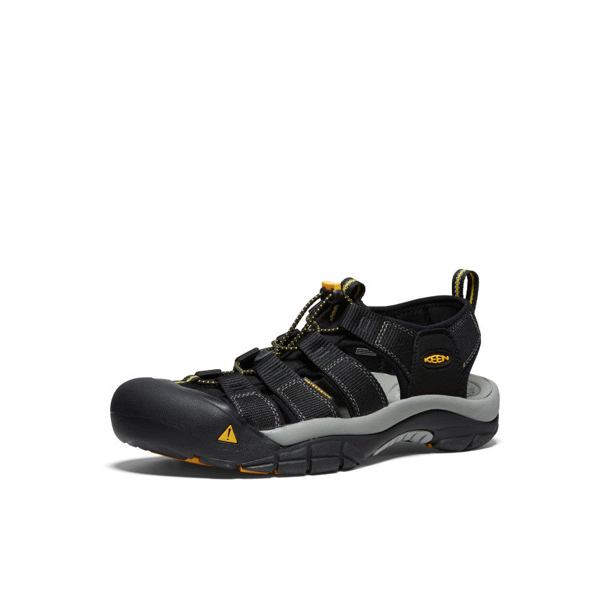 Keen Newport H2 sandals in black with yellow accents, quick-draw elastic lacing system, and rugged sole, side view.