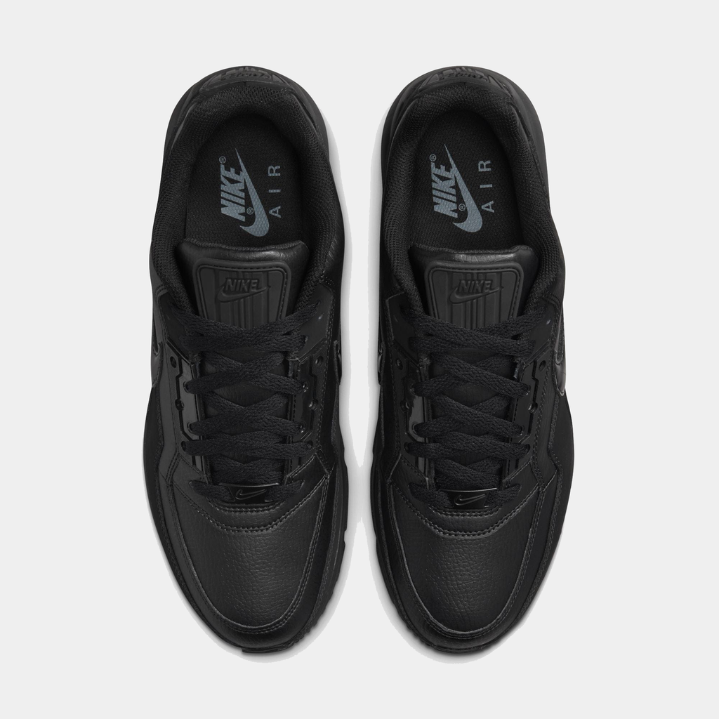 Black Nike Air sneakers on a white background