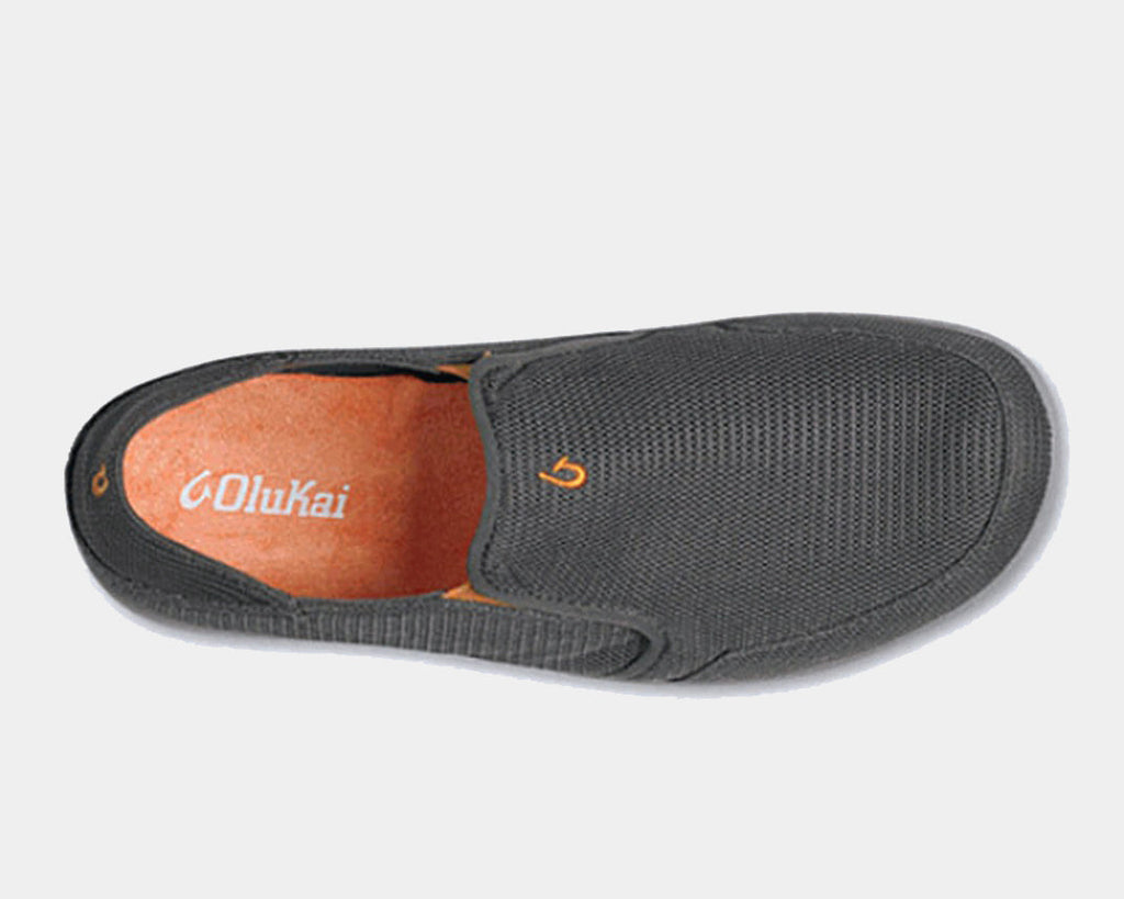 OluKai Nohea Mesh slip-on shoes in charcoal gray with mesh upper, orange insole, and embroidered logo, top view.