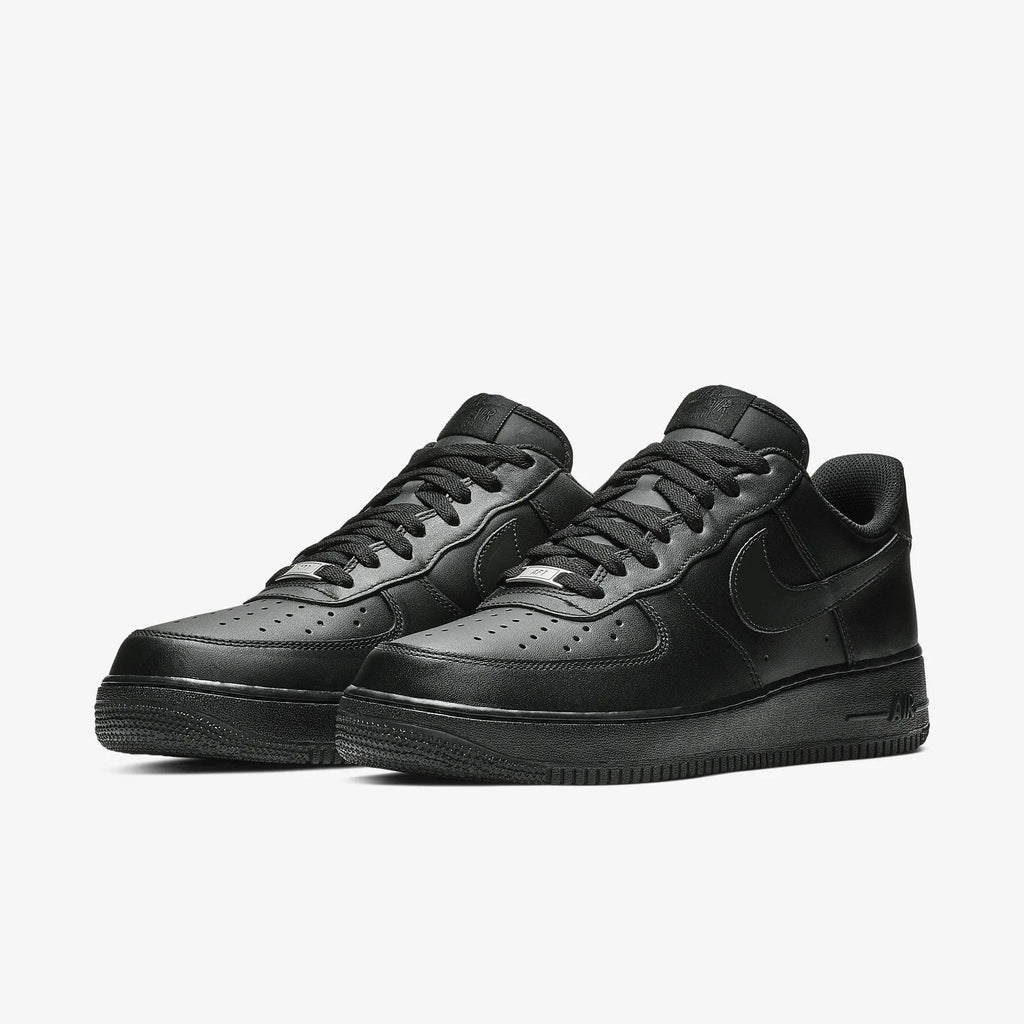 Nike Air Force 1 '07 sneakers in all-black leather with perforated toe box and tonal laces, front angle view.