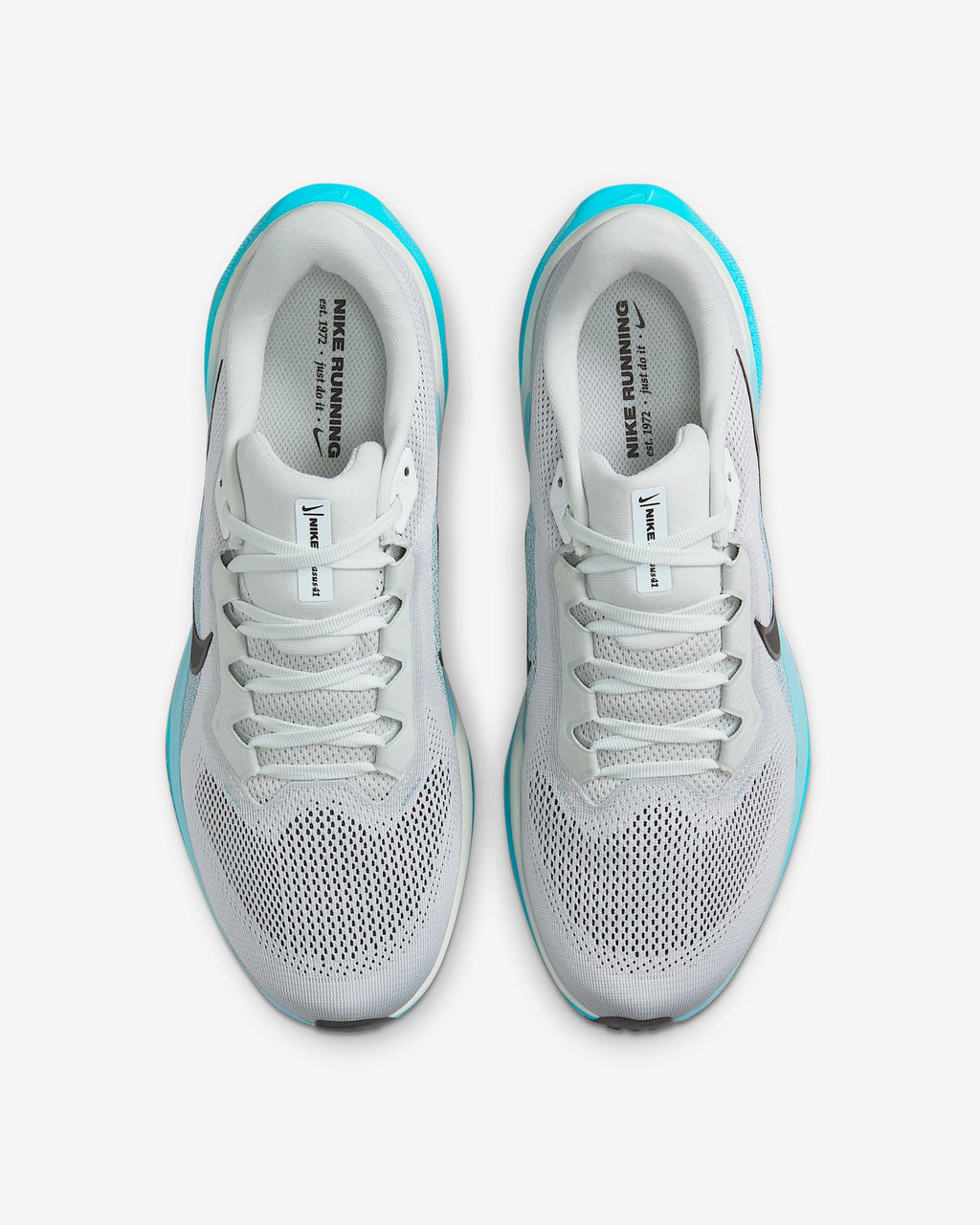 A pair of white Nike Air Zoom Pegasus 41 running shoes with black and blue accents and a black and white sole.