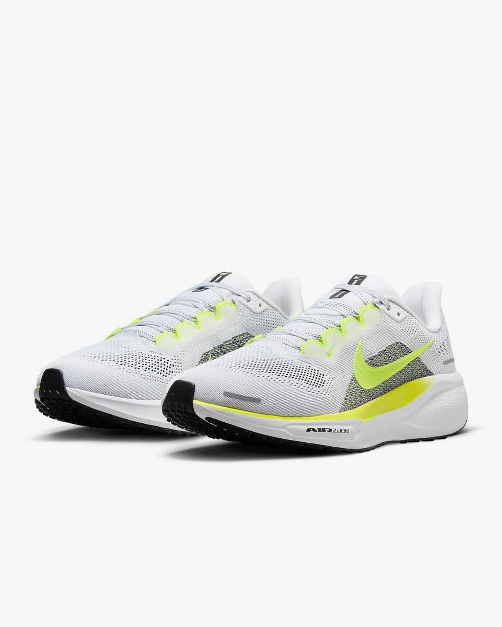 A pair of white Nike Air Zoom Pegasus 41 running shoes with yellow and grey  accents and a white and black sole.