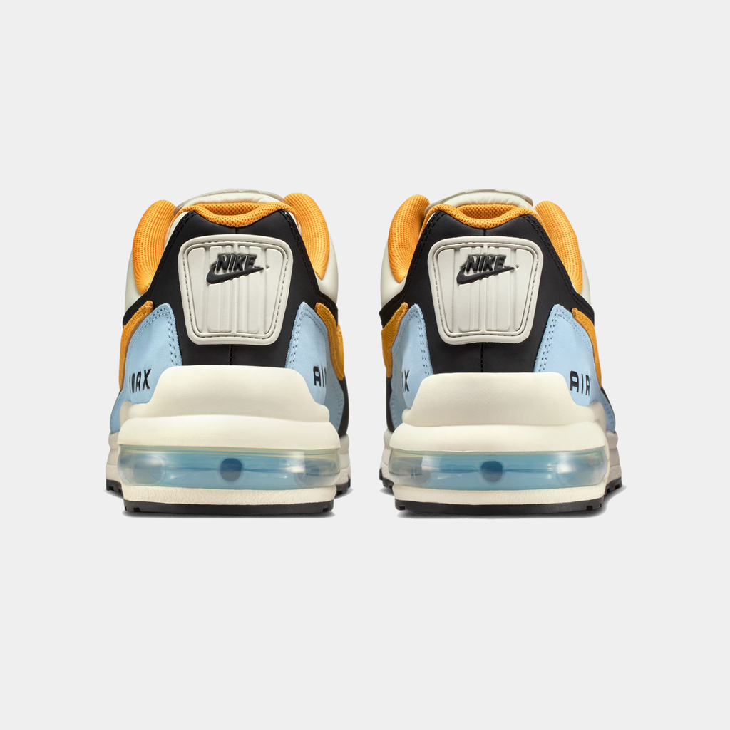 Pair of Nike sneakers showing the sole and brand logo on a white background