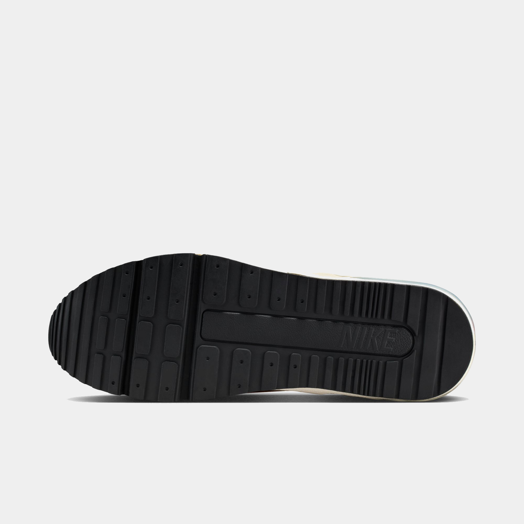 Black sole of a sneaker with Nike logo on a white background