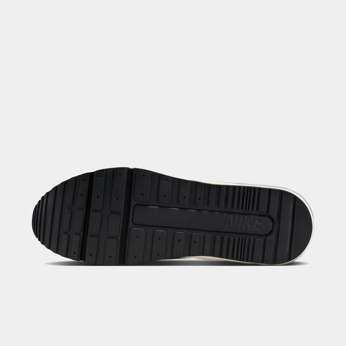 Black sole of a sneaker with Nike logo on a white background