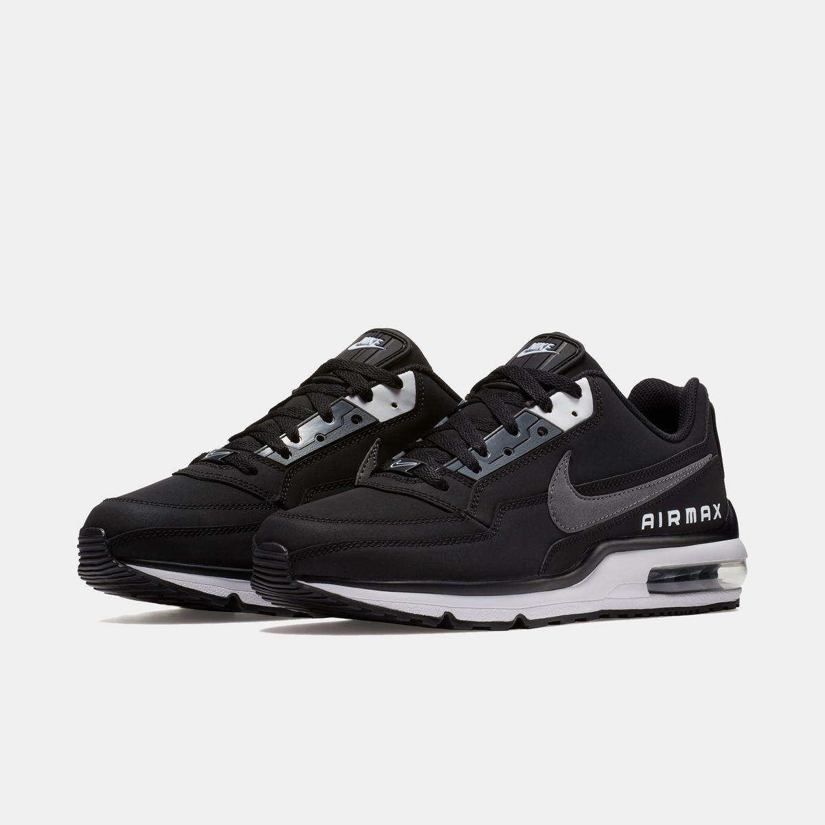 Black Nike Air Max sneakers on a white background