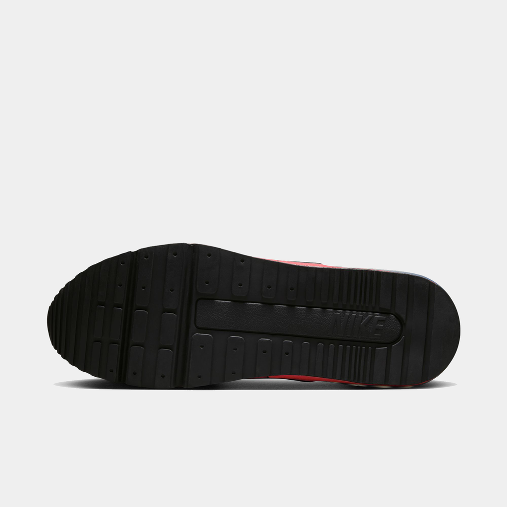 Black sole of a sneaker with visible Nike logo on a white background