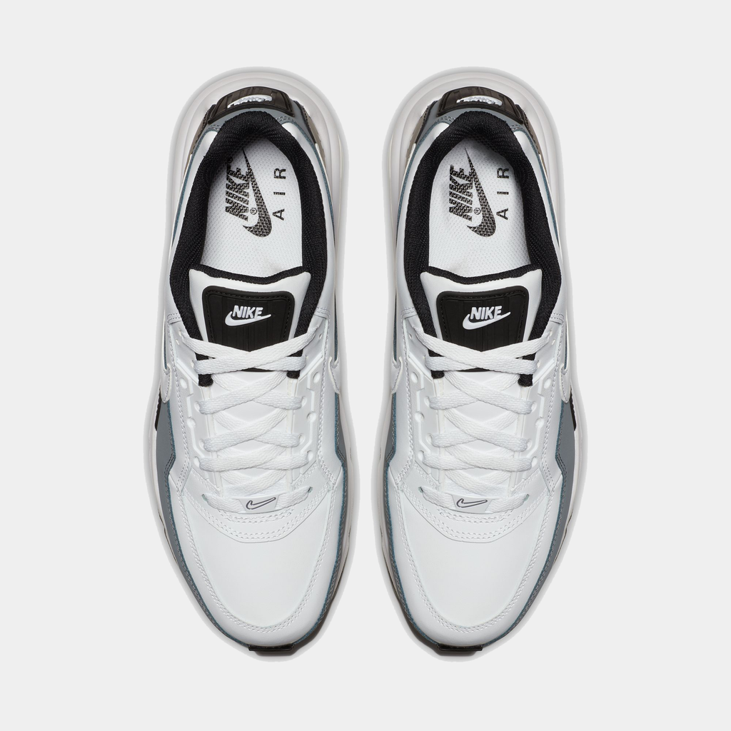 White Nike Air sneakers with black swoosh logo on a white background