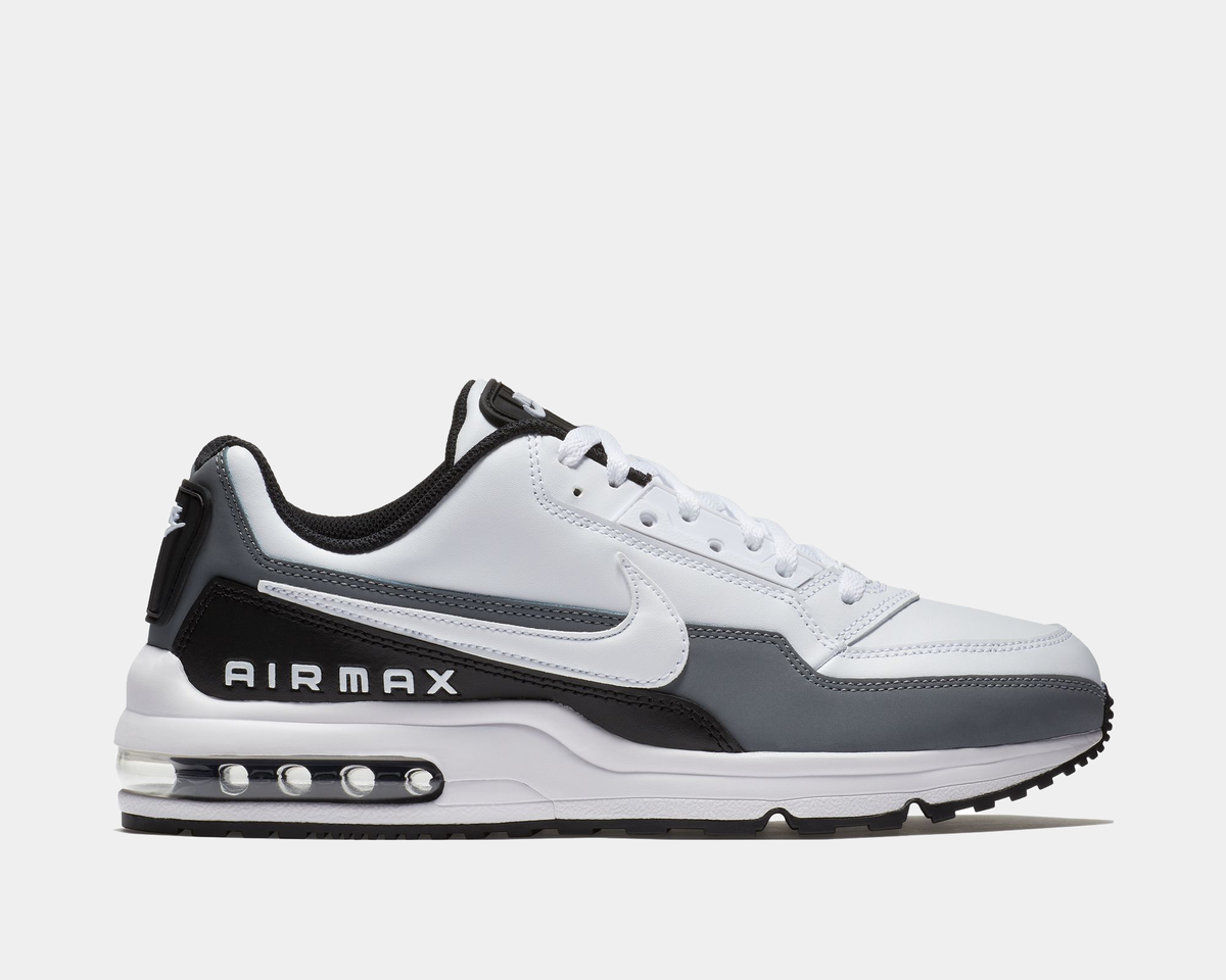 White and black sneaker with 'Air Max' branding on a light gray background