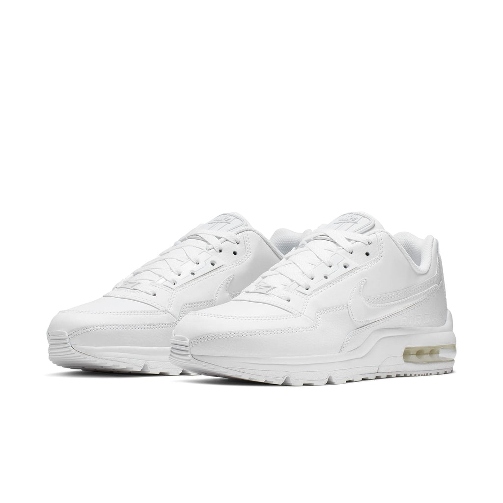 Nike Air Max LTD 3 sneaker featuring a white on white color scheme with leather upper, visible Max Air unit in the heel, and a rubber outsole.