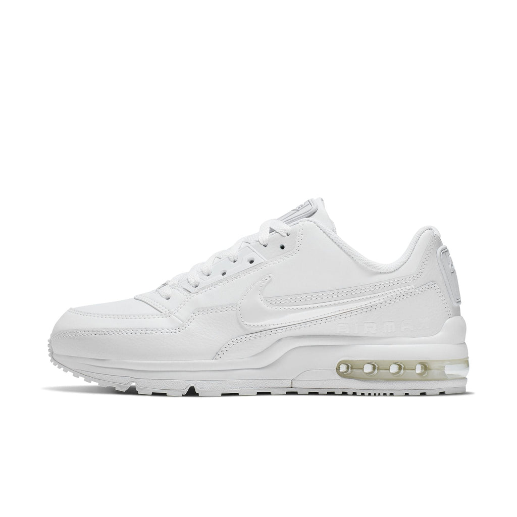 Nike Air Max LTD 3 sneaker featuring a white on white color scheme with leather upper, visible Max Air unit in the heel, and a rubber outsole.