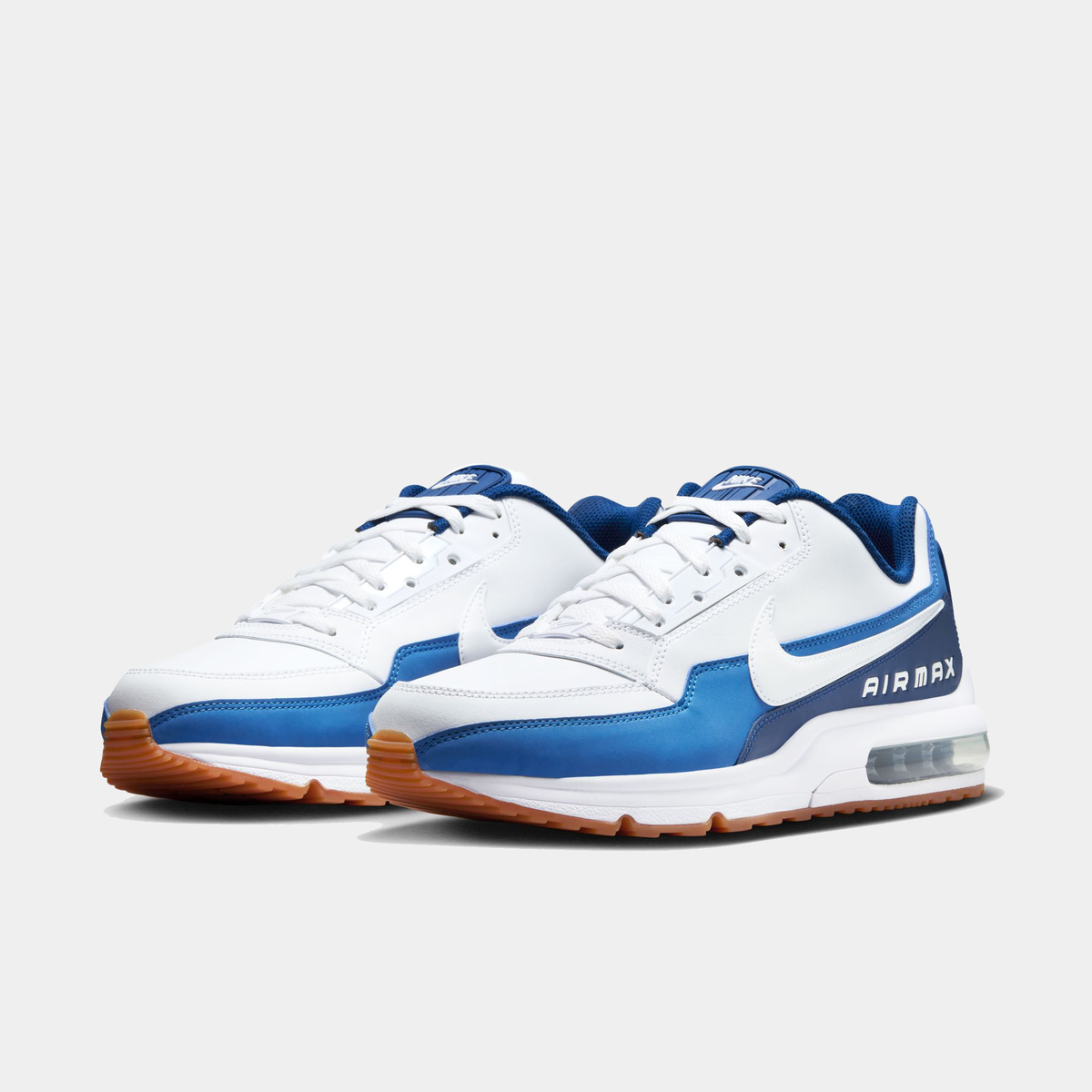 Nike Air Max LTD 3 sneaker featuring a white and blue color scheme with leather upper, visible Max Air unit in the heel, and a rubber outsole.
