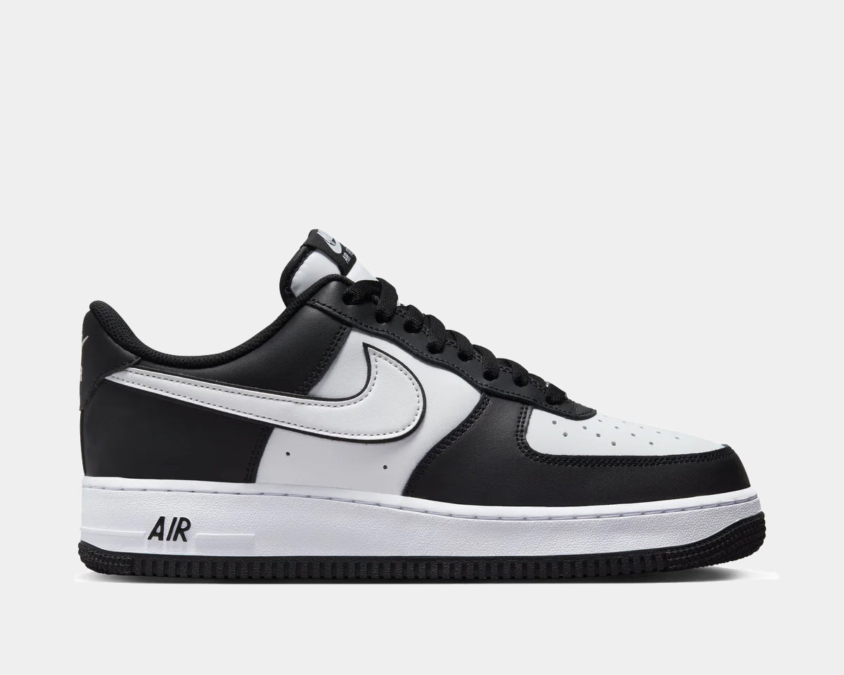 A pair of black and white Nike Air Force 1 '07 sneakers with lace-up closure.