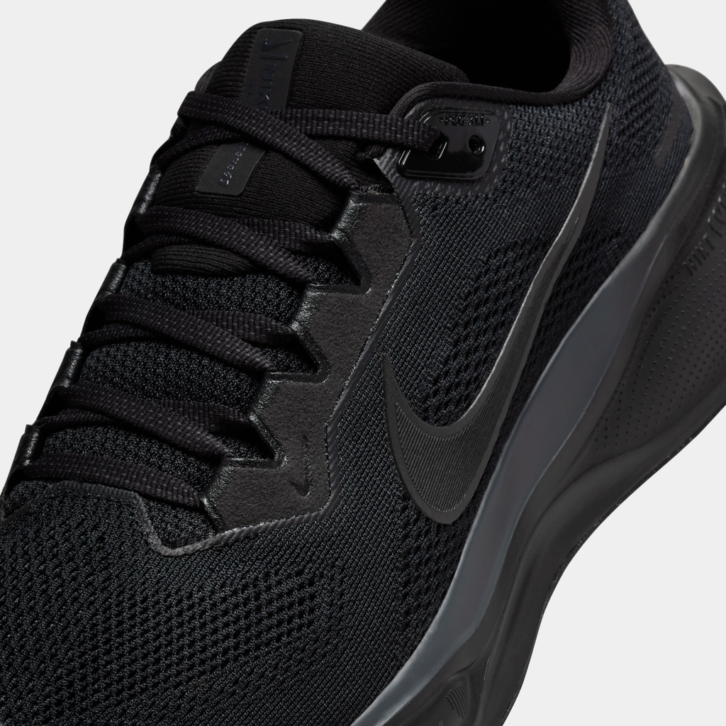 A pair of black  Nike Air Zoom Pegasus 41 running shoes with red accents on a white background.