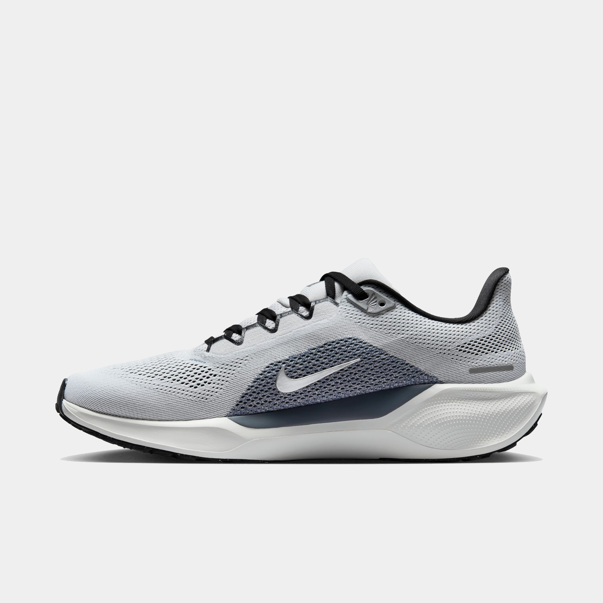 A pair of white and black Nike Air Zoom Pegasus 41 running shoes with a white and black sole.