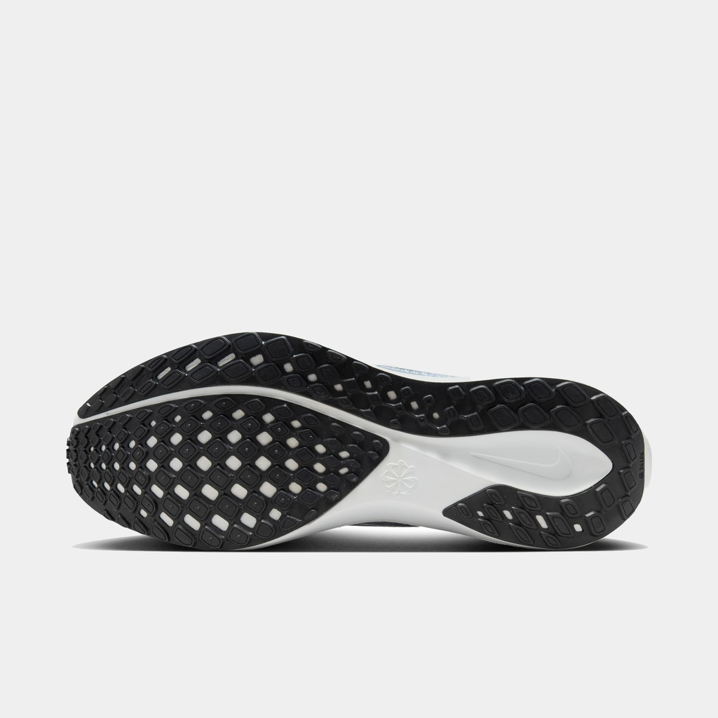 A pair of white and black Nike Air Zoom Pegasus 41 running shoes with a white and black sole.