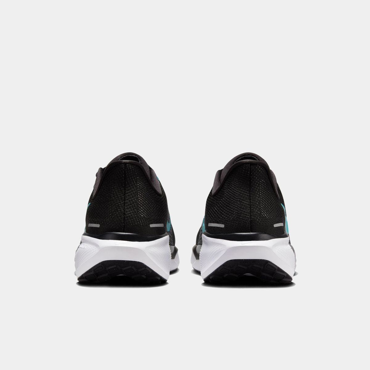 A pair of black Nike Air Zoom Pegasus 41 running shoes with turquoise accents and a black and white sole.