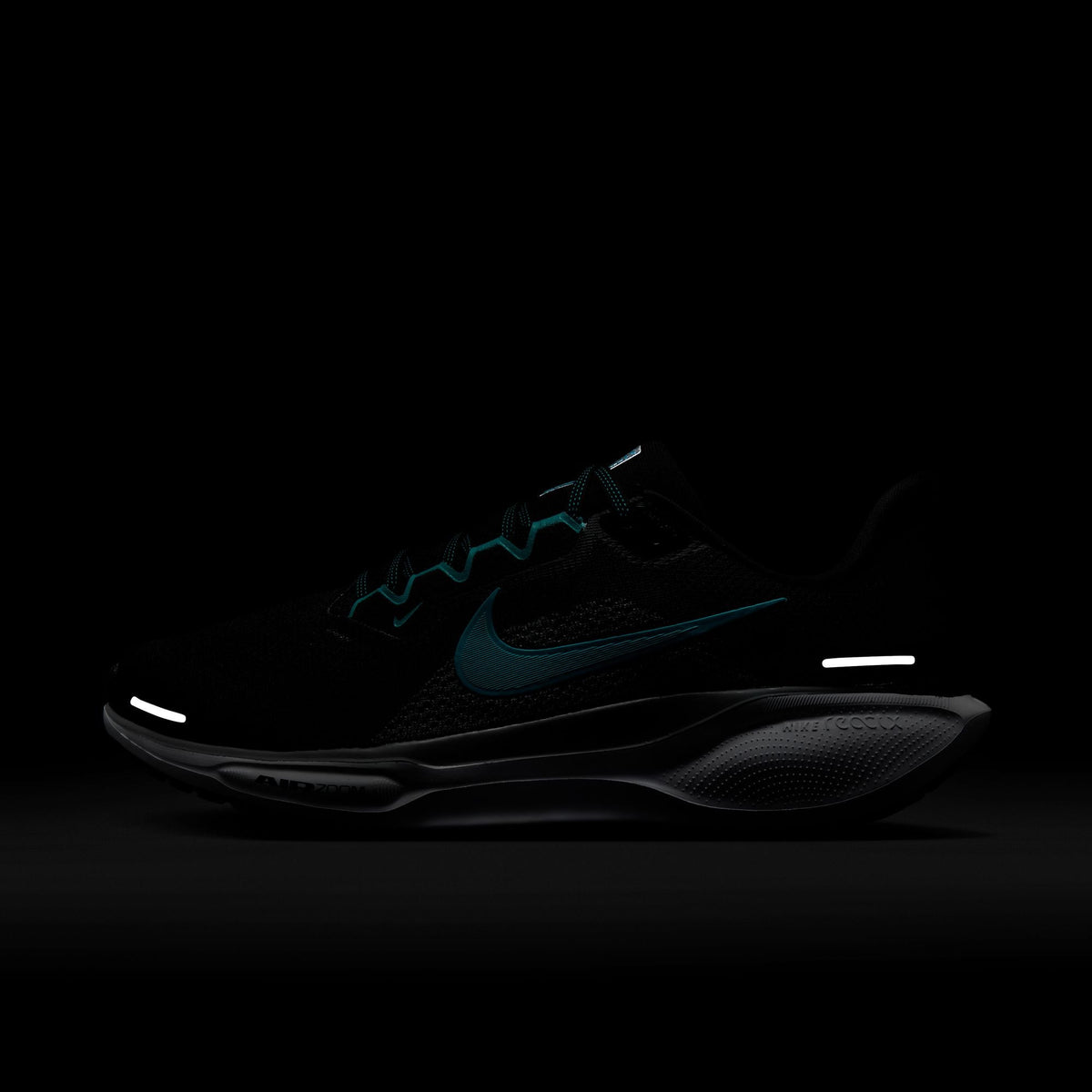 A pair of black Nike Air Zoom Pegasus 41 running shoes with turquoise accents and a black and white sole.