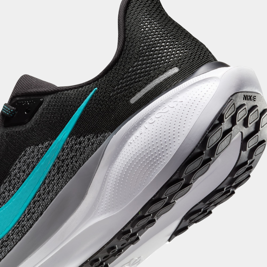 A pair of black Nike Air Zoom Pegasus 41 running shoes with turquoise accents and a black and white sole.