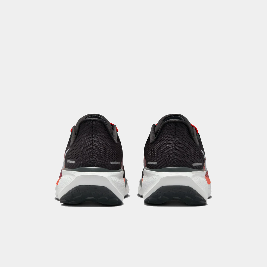 A pair of black Nike Air Zoom Pegasus 41 running shoes with white and red accents and a black and white sole.